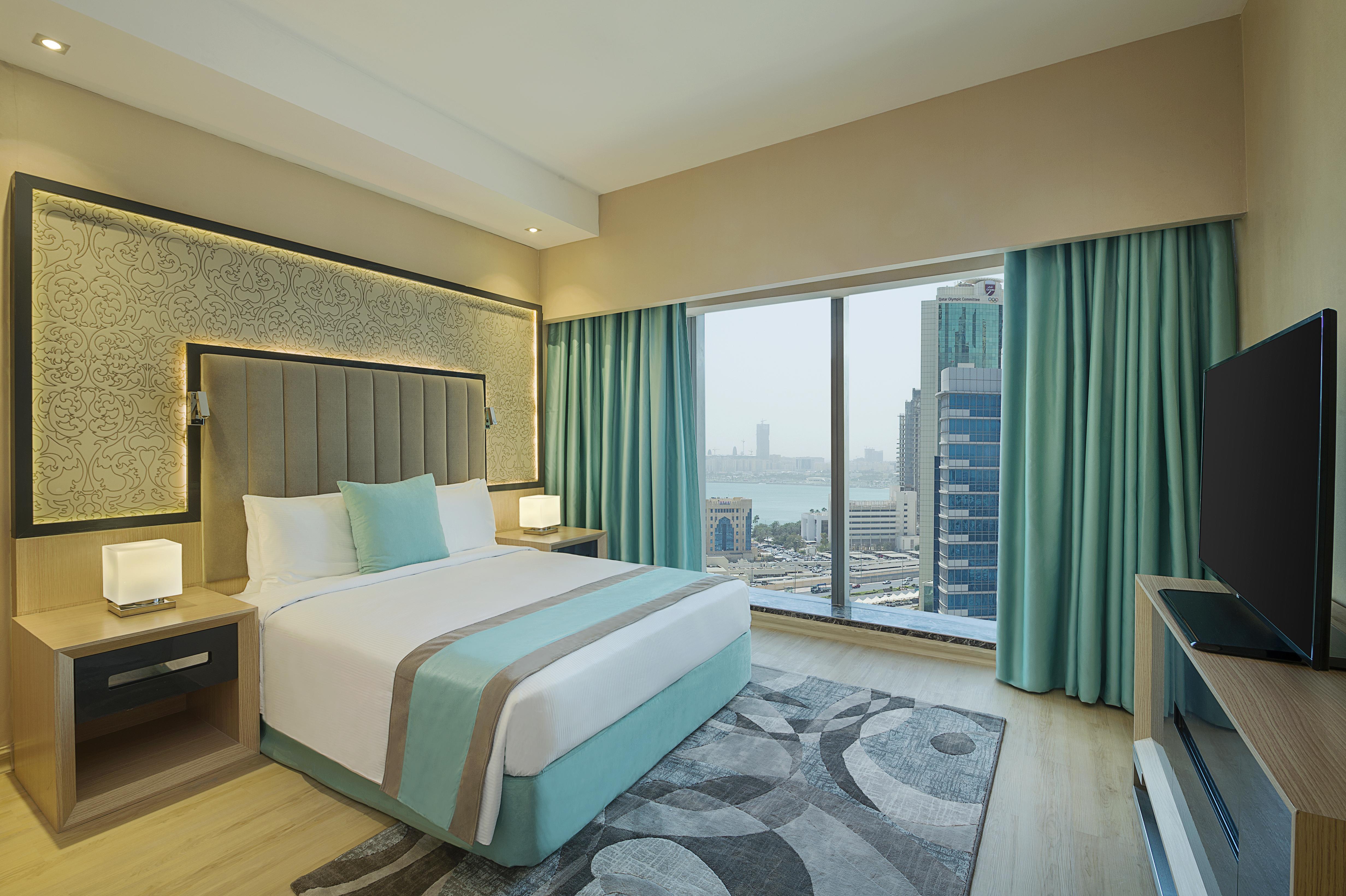 Готель Wyndham Doha West Bay Екстер'єр фото A bedroom at the hotel