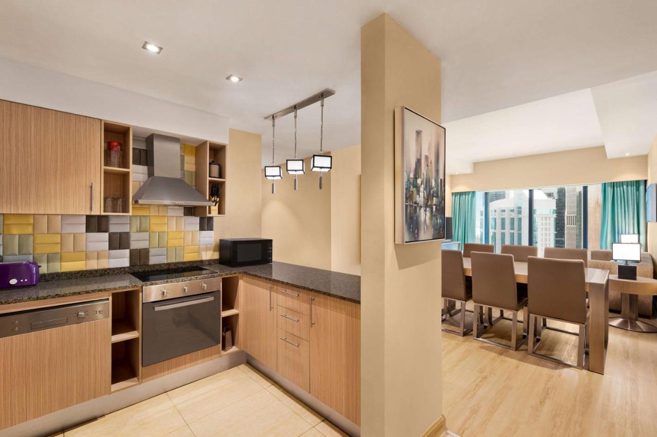 Готель Wyndham Doha West Bay Екстер'єр фото A typical apartment interior